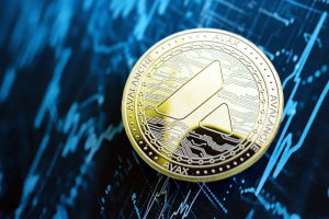 Avalanche AVAX coin on abstract fictional cryptocurrency trading chart in blue color close up